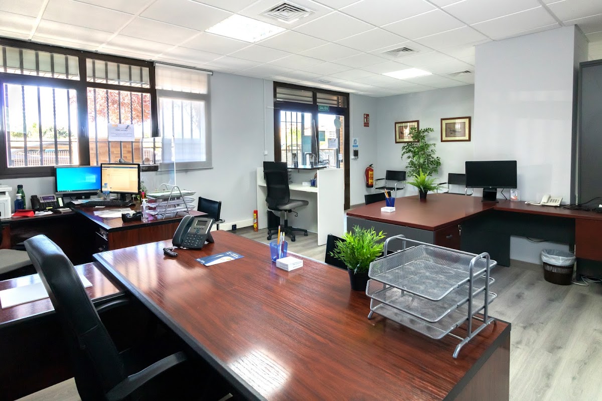 Photo de Centro De Negocios Quiñón