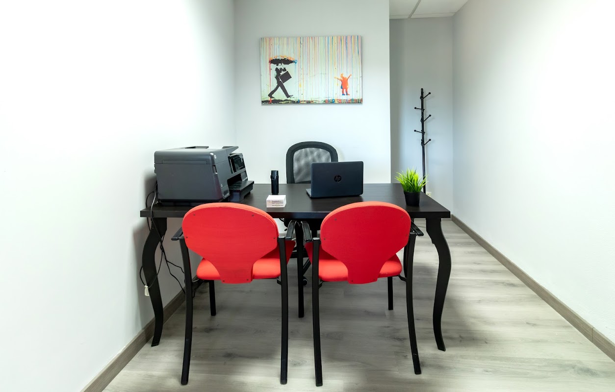 Photo de Centro De Negocios Quiñón